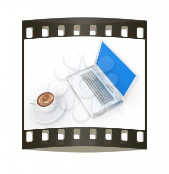 3d cup and a laptop on a white background. The film strip