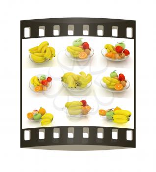 Set of citrus on a glass plate on a white. The film strip