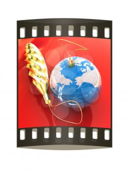 Traditional Christmas toys on a reflective background. Global holiday concept. The film strip