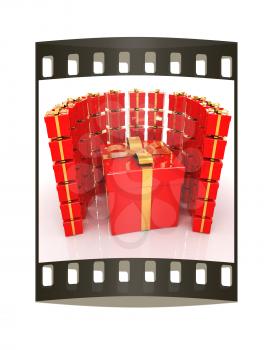 Bright christmas gifts on a white background. The film strip