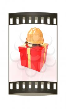 hard hat on a red gift on a white background. The film strip
