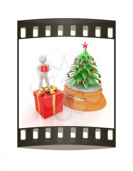 3D human, gift and Christmas tree on a white background. The film strip