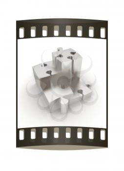 Concept of growth of metall puzzles on a white background. The film strip