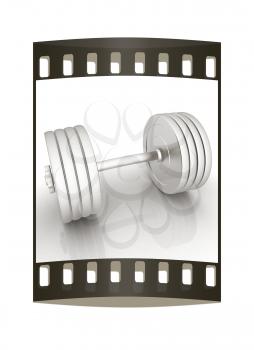 Metalll dumbbell on a white background. The film strip