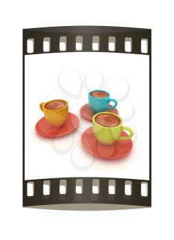 Coffee cups on saucer on a white background. The film strip