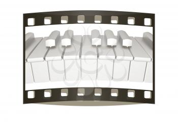 Piano isolated on white background. The film strip