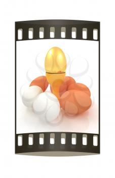Eggs and gold easter egg on egg cups. The film strip