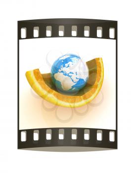 Earth and orange fruit on white background. Creative conceptual image. The film strip