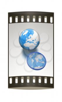 Clock of world map and earth on metallic background. The film strip