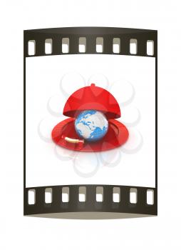 Earth globe on glossy silver dish under food cover over isolated on white. The film strip