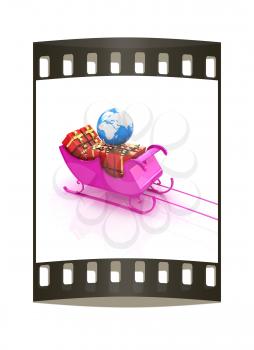 Christmas Santa sledge with gifts on a white background. The film strip