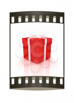 Bright christmas gift on a white background. The film strip