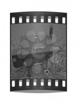 oven barbecue grill on the green grass. The film strip