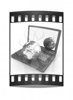 Eco Wooden Laptop and Earth on white background. The film strip
