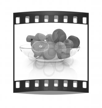 Citrus on a plate on a white background. The film strip