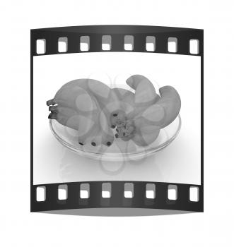 bananas on a plate on a white background. The film strip