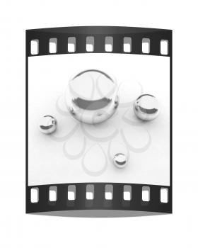 Chrome Balls on a white background. The film strip