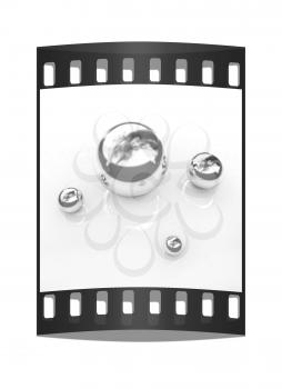 Chrome Balls on a white background. The film strip
