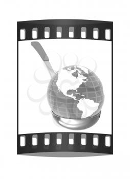 Blue earth on soup ladle on a white background. The film strip