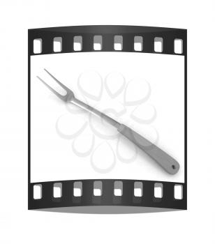 Large fork on white background. The film strip