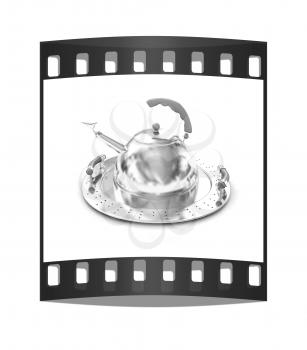 Chrome teapot on platter on a white background. The film strip