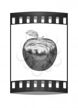 Metal apple isolated on white background. The film strip
