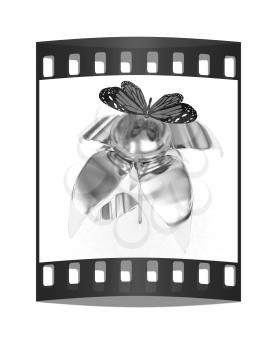Red butterflys on a chrome flower with a gold head on a white background. The film strip