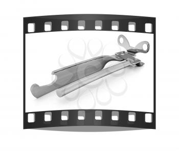 A can opener isolated against a white background (CLIPPING PATH). The film strip