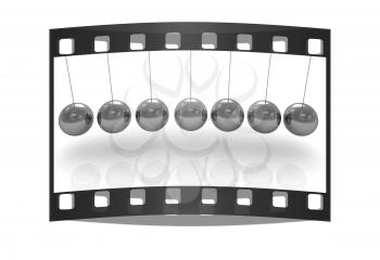 Newton's balls on white background. The film strip