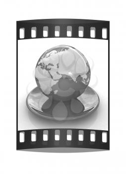  Globe on a saucer on a white background. The film strip