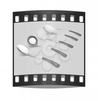 cutlery on a light gray background. The film strip
