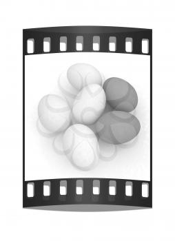 Chicken Eggs on a white Background. The film strip