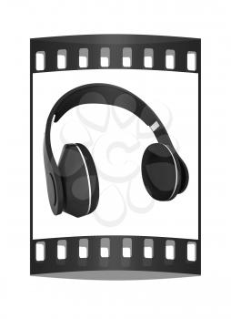 Headphones of carbon material isolated on a white background. The film strip