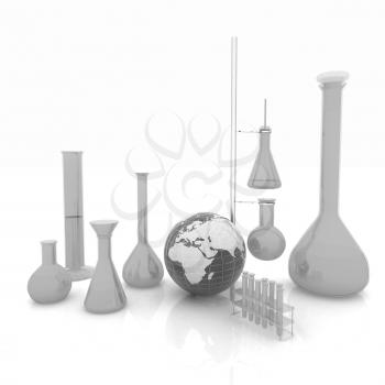 Chemistry set, with test tubes, and beakers filled with colored liquids and Earth