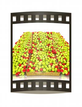 Wicker basket full of apples isolated on white