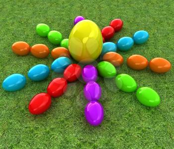 Colored Easter eggs as a flower and Big Easter Egg in the centre on a green grass