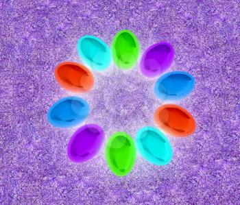 Colored Easter eggs as a flower on a grass