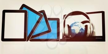 headphones and  earth on the  laptop and tablet pc on a white background. 3D illustration. Vintage style.