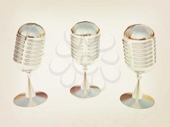 3 metal microphones on a white background. 3D illustration. Vintage style.