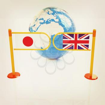 Three-dimensional image of the turnstile and flags of UK and Japan on a white background . 3D illustration. Vintage style.