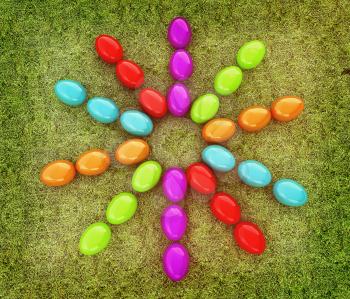Colored Easter eggs as a flower on a green grass. 3D illustration. Vintage style.