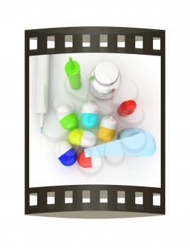 Syringe, tablet, pill jar. 3D illustration. The film strip