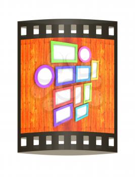 Mock up picture frames on wood wall. 3d illustration. The film strip