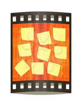 Mock-up of Sticky note paper on a wooden wall. 3D illustration. The film strip