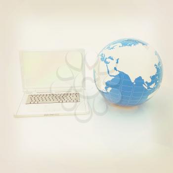 Laptop and Earth. 3d illustration
