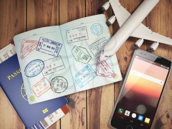 Travel and tourism concept. Passport with visas and boarding passes, airplane and mobile on the wood table. 3d illustration