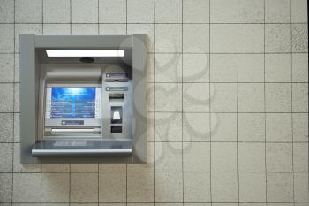 ATM machine. Automated teller bank cash machine on concrete wall. 3d illustration