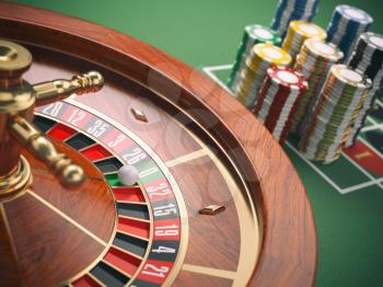 Casino roulette wheel with casino chips on green table. Gambling background. 3d illustration
