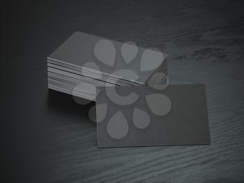 Black blank business cards mockup on black wood table background, 3d illustration