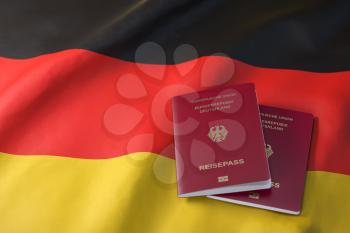 Passport of Germany on the flag of the Germany. Getting a Germnay passport,  naturalization and immigration concept. 3d illustration